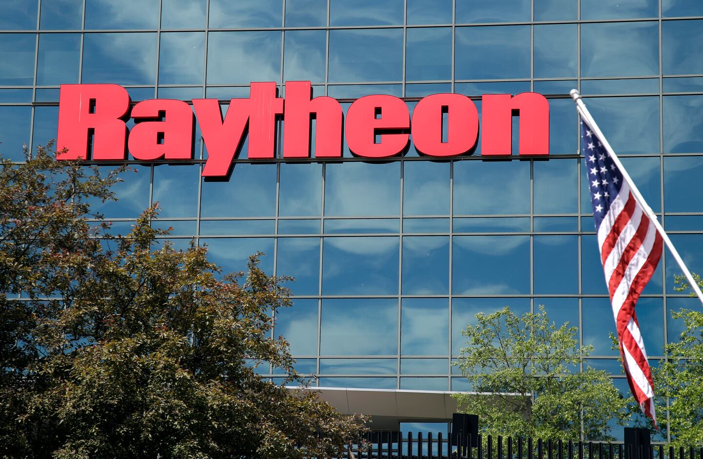 A former Raytheon employee claims the Waltham-based company paid him $1 million after he was punished for revealing that he was instructed to submit false data to the US Air Force.