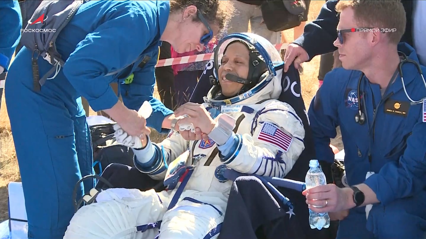 In this image taken from video released by Roscosmos space corporation, NASA astronaut Christopher Williams sits in a chair shortly after the landing of the Russian Soyuz MS-28 space capsule, near Kazakh town of Zhezkazgan, Kazakhstan, on July 26, 2026.