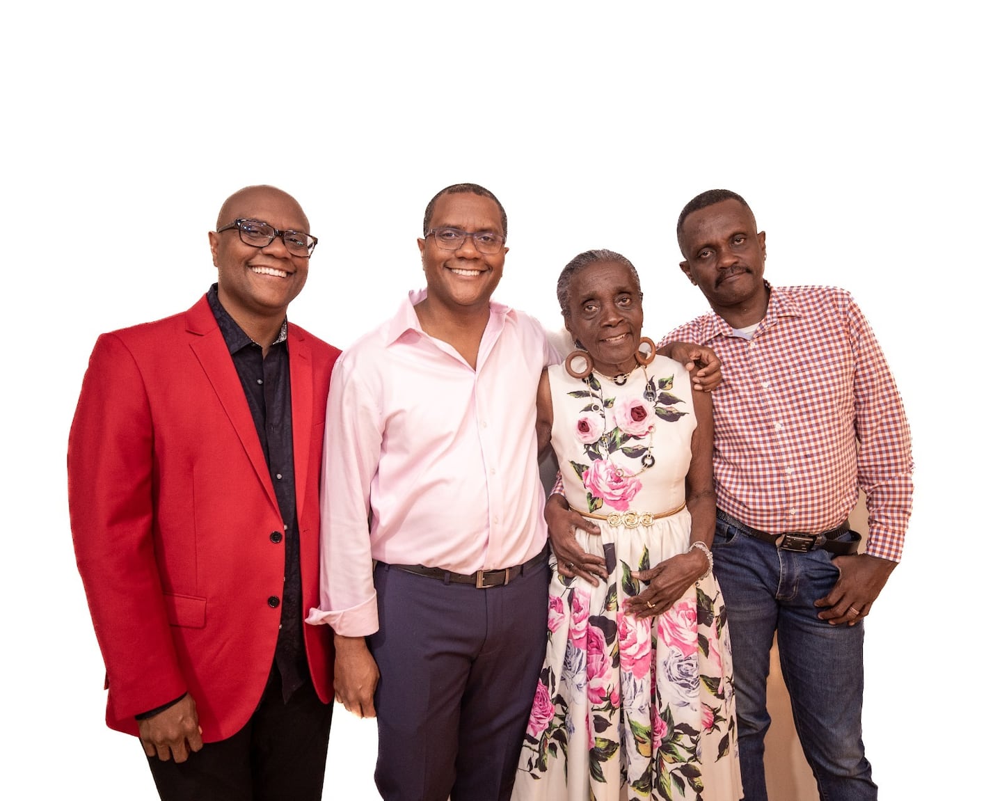 Emmanuel Damas from Haiti, who lived in Boston, recently died in ICE custody in Arizona. He stands on the right in a family photo. 